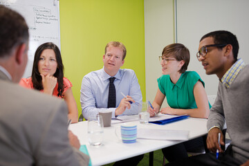 Business people talking in meeting