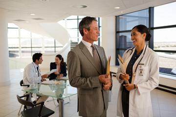 Fototapeta premium Close up of senior patient's hands in hospital bed