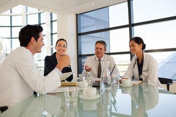 Fototapeta premium Portrait of smiling nurse in hospital corridor