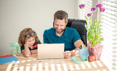 boy do homework with private tutor. webinar video lesson. online education on laptop.