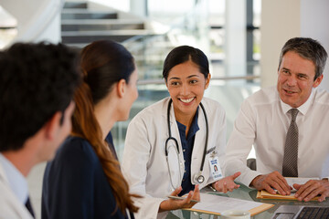 Fototapeta premium Doctors rushing down hospital corridor