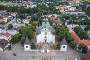 Assumption of Blessed Virgin Mary basilica on main square of Wegrow town, Masovia region of Poland