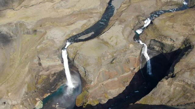 Drone flying high over Haifoss and Granni waterfalls in Iceland