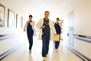 Doctors and businesswoman talking in meeting