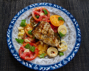 Grilled Swordfish with Heirloom Tomato's, Basil and Hearts of Palm Salad.