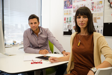 Portrait of smiling business people in office