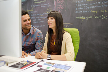 Business people working at computer in office