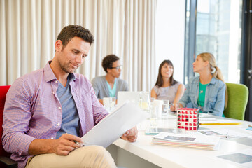 Portrait of businessman in meeting