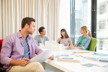 Portrait of businessman in meeting