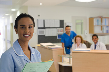 Nurse standing in hospital hallway