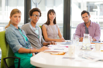 Portrait of business people smiling in meeting