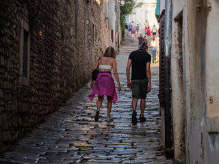 people on the narrow streets