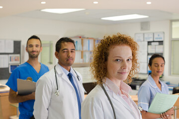 Fototapeta premium Doctors and nurse smiling in hospital
