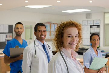 Doctors and nurse smiling in hospital