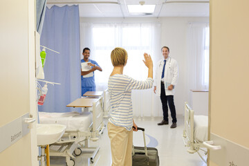 Patient leaving hospital room