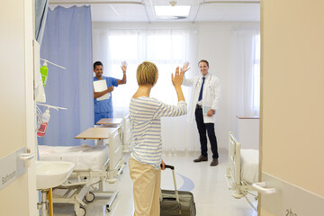 Patient leaving hospital room