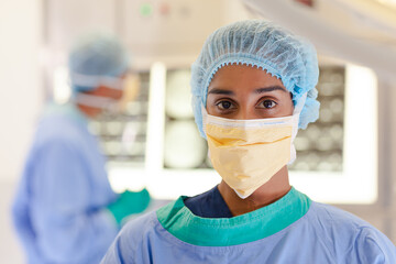 Surgeon standing in operating room