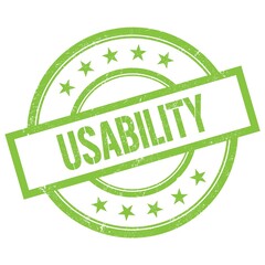 USABILITY text written on green vintage stamp.