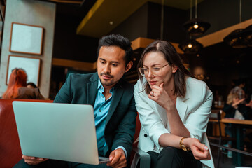 business people working together on the computer