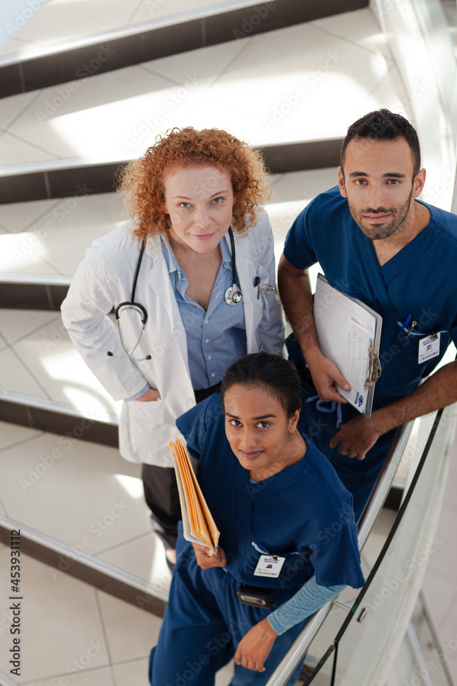 Wall mural doctor and nurses on hospital steps