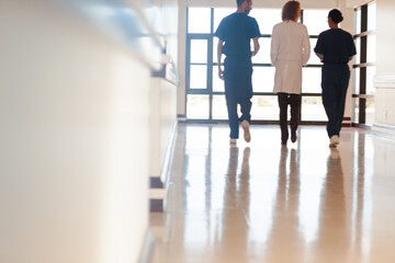 Hospital staff walking in hallway