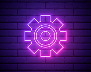 Gear, maintenance. Pink neon vector icon. Glowing gear symbol isolated on brick wall background.