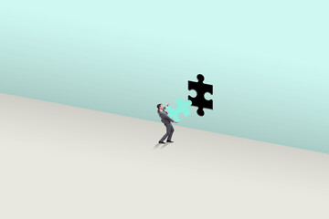 Businessman putting missing jigsaw puzzle piece