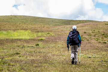 Woman doing trekking in the Andes
