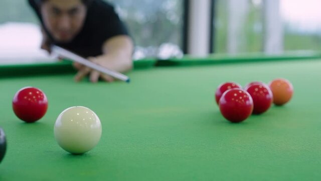 Close up of Snooker shooting on snooker table in slow motion
