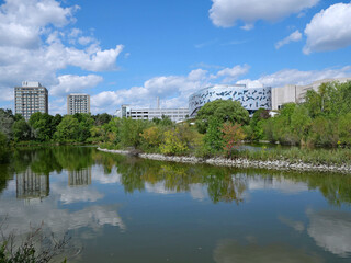 Fototapeta na wymiar Toronto, Canada - August 30, 2021: View of York University campus from the west, with Lassonde School of Engineering beside the pond.