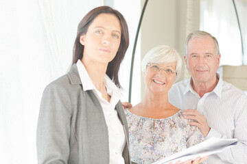 Fototapeta premium Financial advisor posing with clients