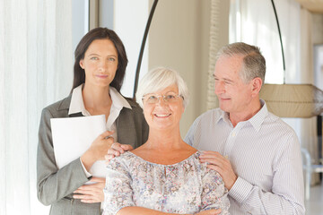 Fototapeta premium Financial advisor posing with clients