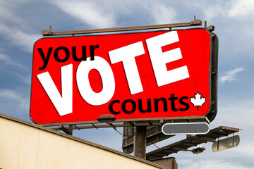 Patriotic VOTE billboard sign as an election politics symbol, promoting democratic right & duty to vote - your vote counts