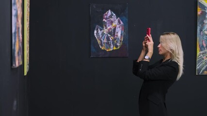 She cannot buy it, but she can take a photo as a memento