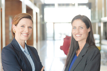 Businesswomen smiling in office