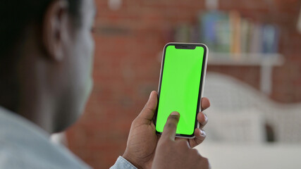 African Man Using Chroma Key Smartphone Screen