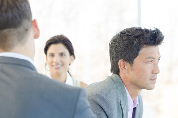 Fototapeta premium Businessmen smiling in office
