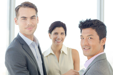Business people smiling in office