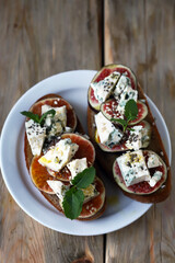 Delicious toast with gorgonzola cheese and figs. Healthy snack. Keto toast.