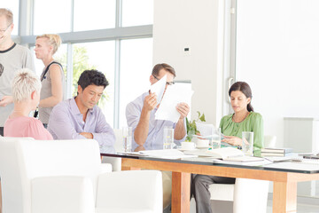 Business people talking in meeting