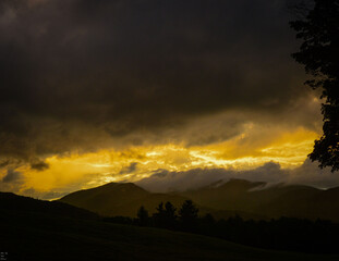Naklejka na ściany i meble Golden Sunrise Over the Adirondack Mountains