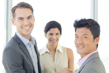 Business people smiling in office