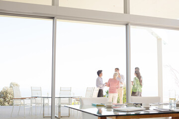 Business people talking outside office