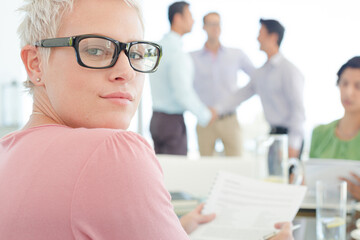 Fototapeta premium Businesswoman smiling in meeting