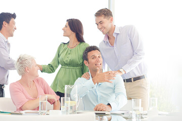 Business people shaking hands in meeting