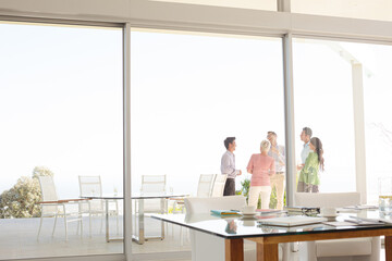 Business people talking outside office