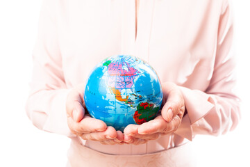 woman holds planet earth in her hand on a white background, isolate