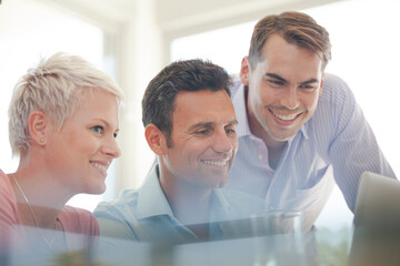 Fototapeta premium Business people using laptop in meeting