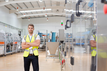 Worker smiling in factory