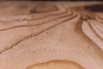 Close-up details of used, distressed, weathered pine pallet wood grain pattern with selective focus for copy space on a black background.